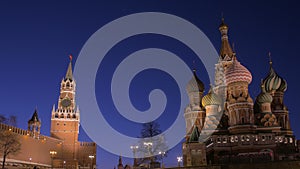 amazing view on Kremlin tower and Saint Basil Cathedral against dark sky