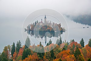 Amazing view of Lake Bled at foggy autumn morning