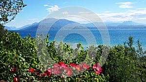 Amazing view of Lake Garda from the park Parco Pubblico Tomelleri in Sirmione town, Italy