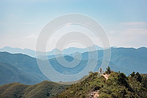 Amazing view of Man talking on footpath on mountain, near the Sharp Peak, Sai Kung, Hong Kong