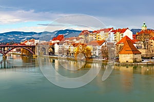 Amazing view of Maribor Old city, medieval water tower on the Drava river at morning, Slovenia