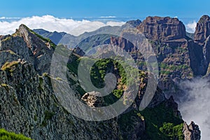 Amazing view on the mountain peaks from Pico do Arieiro on Madeira island photo