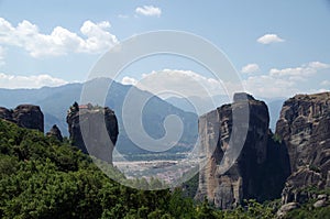 Amazing view of the mountains, the monastery of the Holy Trinity and the village of Kalambaka in Meteora, Greece photo