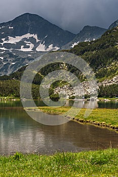 Amazing view of Muratovo Lake and reflection of Banski Suhodol Peak