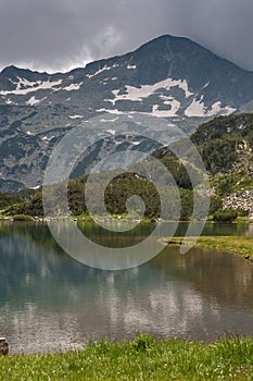 Amazing view of Muratovo Lake and reflection of Banski Suhodol Peak, Pirin Mountain photo