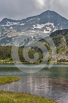 Amazing view of Muratovo Lake and reflection of Banski Suhodol Peak photo