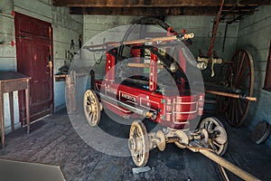 Amazing view of old vintage, retro, classic fire pump vehicle, trailer in the garage