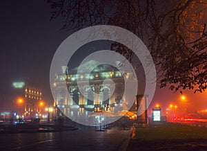 Amazing view of Opera House in Lviv, Ukraine at foggy autumn night