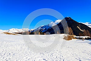 Amazing view over snow covered Swiss Alps near Davos, Switzerland
