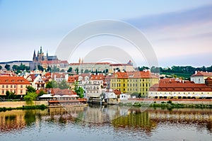 Amazing view of Prague Castle and historical old town taken with Vltava river. Sunrise light. Capital of Czech Republic. Beautiful