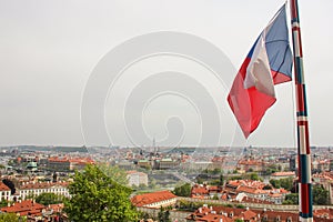 Amazing view from Prague castle to historical center of Prague,buildings and landmarks of old town. Flag of Czech