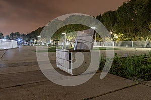 Amazing view of promenade in Malaga, Parmeral de las Sorpresas at late night in the full colors of the night city lights. photo