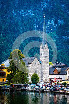 Amazing view of protestant church clock tower in Hallstatt, Austria