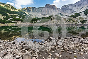Amazing view of roks around Sinanitsa Peak and reflection in the lake, Pirin Mountain