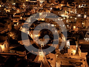 Amazing view of the Sassi of Matera at night. Landscape of the historical part of the town. An Unesco World Heritage Site