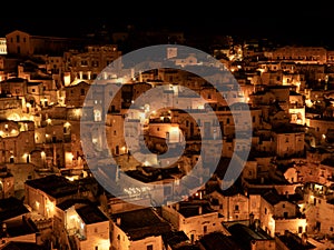 Amazing view of the Sassi of Matera at night. Landscape of the historical part of the town. An Unesco World Heritage Site