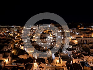 Amazing view of the Sassi of Matera at night. Landscape of the historical part of the town. An Unesco World Heritage Site