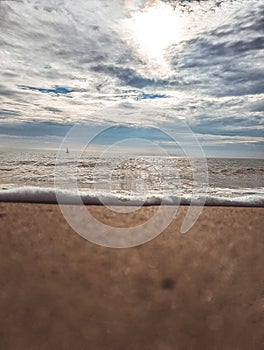 Amazing view of seashore with bright cloudy sky