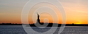 Panoramic view of the Statue of Liberty, at sunset