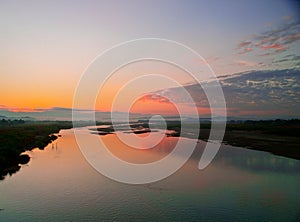 An amazing view of a sunrise in Laoag river