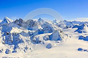 Amazing view of swiss famous moutains in beautiful winter snow. photo