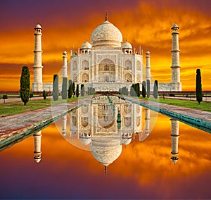 Amazing view on the Taj Mahal in sunset with dramatic sky. The T photo