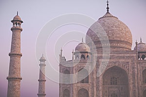 Amazing view on the Taj Mahal in sunset light with reflection in