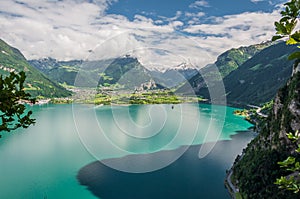 Tourquise lake, roads and Swiss Alps in Switzerland photo