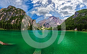 amazing view of turquoise Lago di Braies Lake or Pragser Wildsee in Dolomite mountains, Italy photo