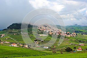 Amazing view of village Gangi in Sicily, Italy photographed in foggy weather. The historical city is located on the top