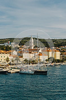 Amazing view of yacht marina and old town Supetar, Brac island, Croatia. Beautiful sunny day