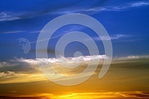Amazing vivid sunset or sunrise cloudy sky for using in design as background