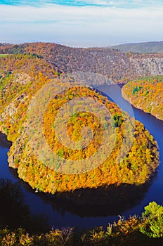 Amazing Vyhlidka Maj, Lookout Maj, near village Teletin, Czechia. Meander of the Vltava river surrounded by autumn forest viewed