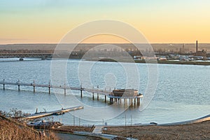 walking pier in plock on vistula river photo