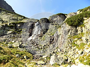 Amazing waterfall between the rocky mountains in the Slovakia