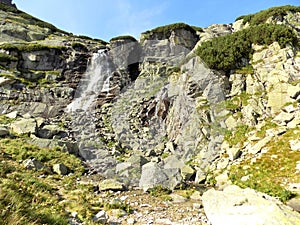 Amazing waterfall between the rocky mountains in the Slovakia