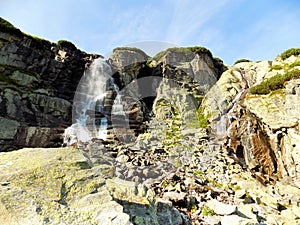 Amazing waterfall between the rocky mountains in the Slovakia