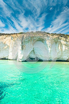 Amazing white cliffs and crystal clear water in Kleftiko Bay, Milos Island,  Greece