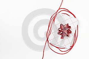 Amazing white red gift box whit ribbon star on white background.