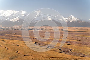 The amazing wild view of kyrgyzstan landscape full of snow peaks and wilderness