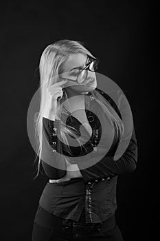 Amazing young lady with straight hair in eyewear and blouse