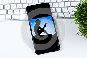 Amazon Kindle app logo on a smartphone screen