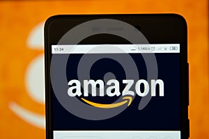 Amazon logo is seen on an smartphone