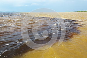 Amazon & Rio Negro waters not mixing, Brazil photo