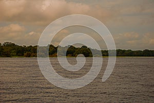 Amazon river, Amazonas, Brazil: Beautiful landscape overlooking the river and bushes and jungle