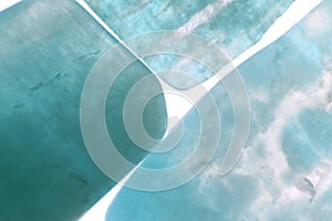 Amazonite jewel stone texture on light surface background