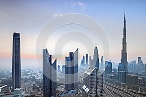 Amazung Dubai city center skyline at sunset, United Arab Emirates