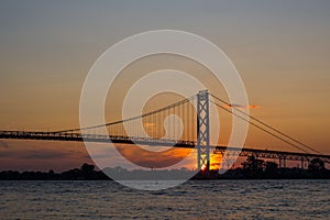 Ambassador Bridge connecting Windsor, Ontario to Detroit Michigan at dusk