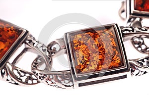 An amber bracelet on white