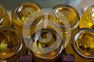 amber color glass wine bottles bottom